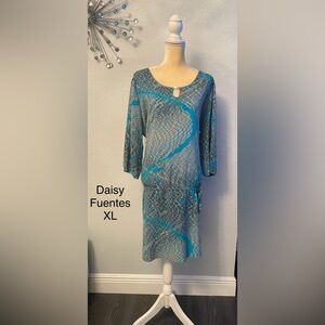 I love that you can hike this dress up shorter with tightening the drawstring